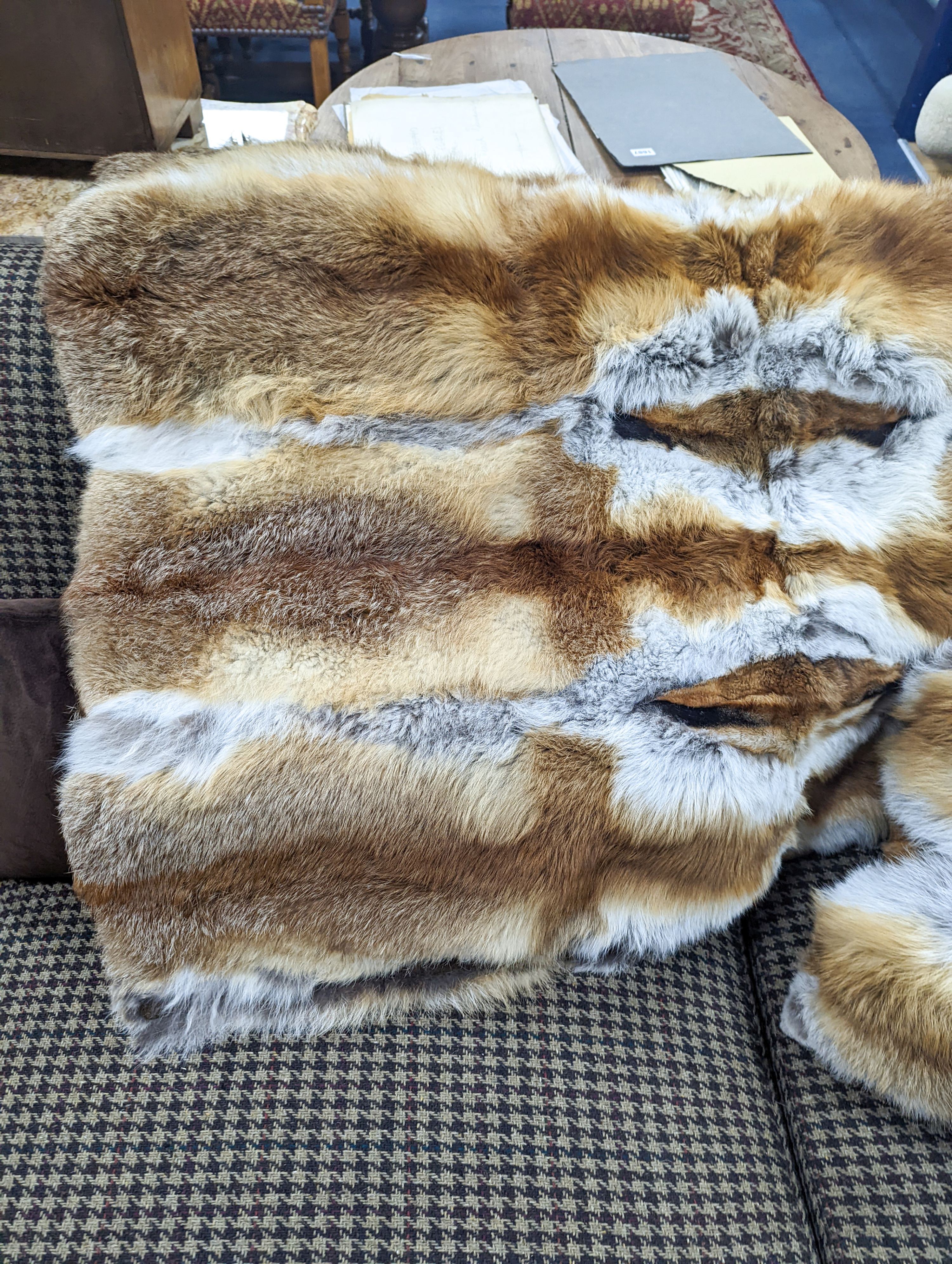 A German red fox fur throw with cashmere and wool back 180 x 135 cms and two red fox fur cushions.